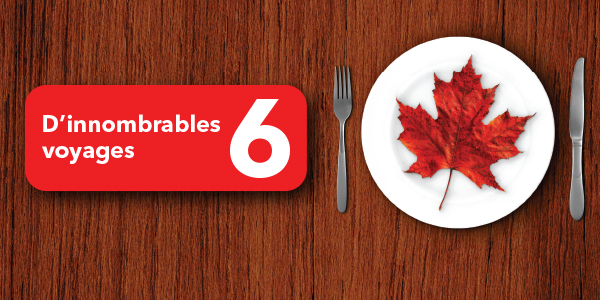 Une assiette sur une surface en bois avec une feuille d’érable, une bannière rouge dit D’innombrables voyages 6.