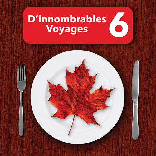Une assiette sur une surface en bois avec une feuille d’érable, une bannière rouge dit D’innombrables voyages six.