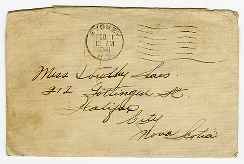 A yellowed envelope, hand addressed to Dorothy Sears at a Halifax address, the postage stamp reads Sydney, NS