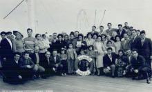Frank Giorno and passengers on board the M.S. Saturnia, 1959. Canadian Museum of Immigration at Pier 21