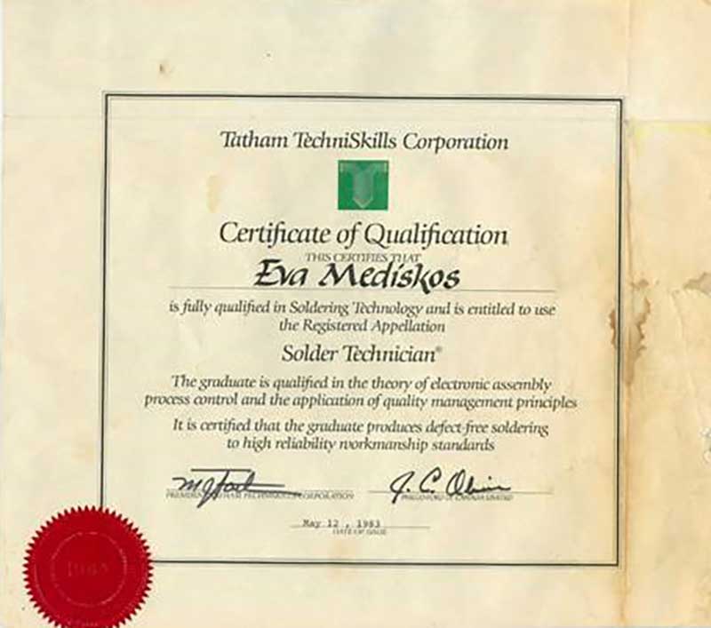 An old certification document identifying Eva Meditskos as a Solder Technician.Un ancien document de certification identifiant Eva Meditskos comme technicien de soudure.