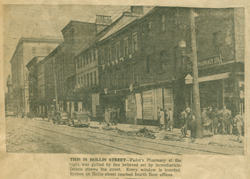 Vieil article de journal montrant les dommages subis sur la rue Hollis à Halifax.